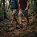 Waterproof hiking shoes on trail with rugged grip for wet weather hikes, trekking, and travel.